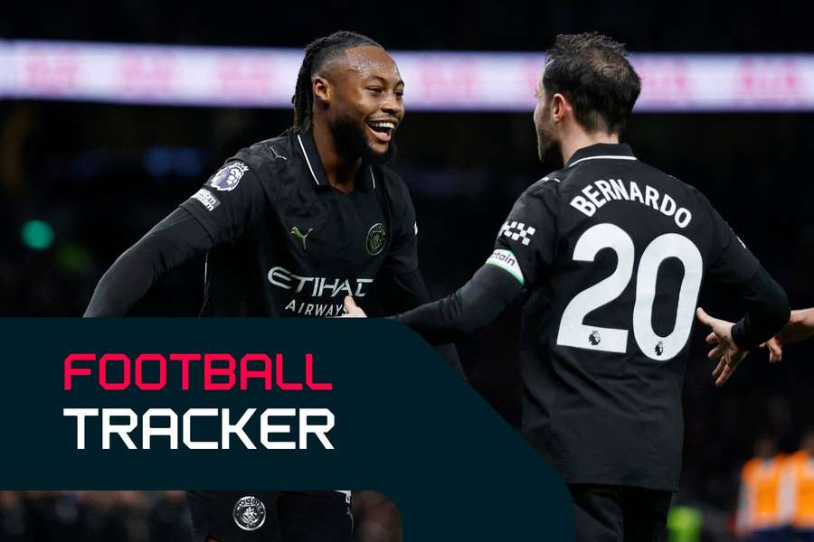 Antoine Semenyo celebrates scoring with Manchester City's Bernardo Silva