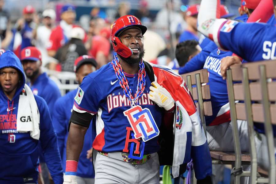 Dominican Republic's Oneil Cruz celebrates after hitting a home run 