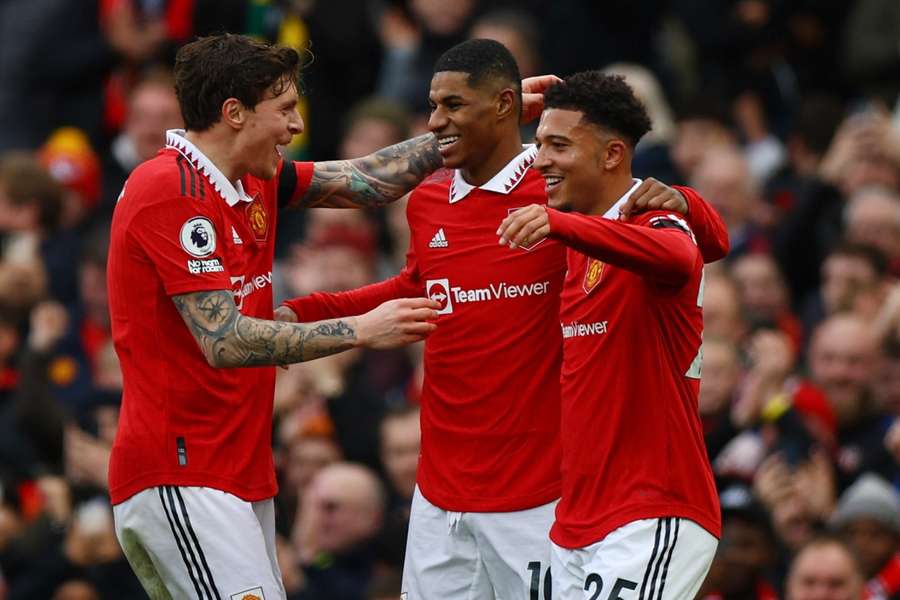 Manchester United's Marcus Rashford celebrates scoring their second goal with Victor Lindelof and Jadon Sancho