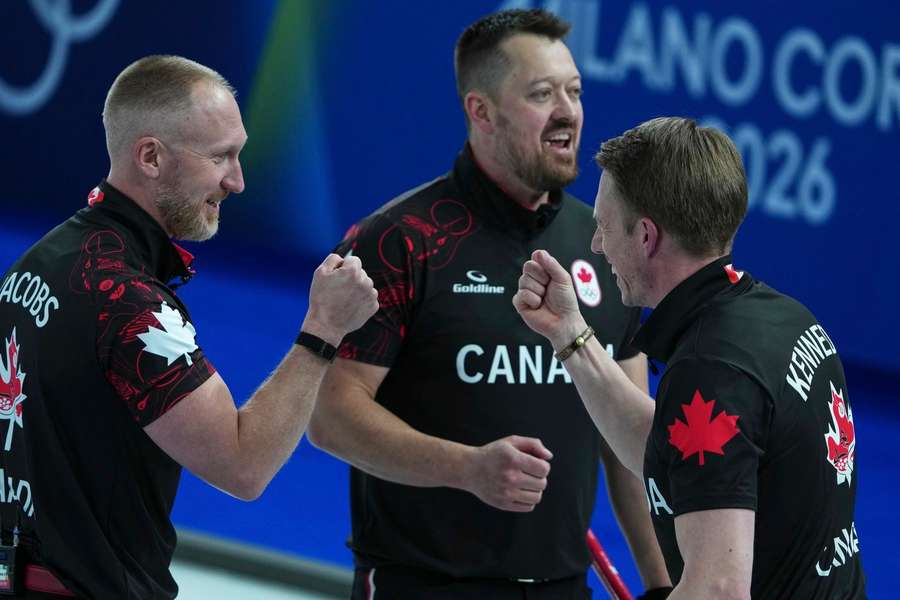 The Canadian team celebrate victory over Sweden