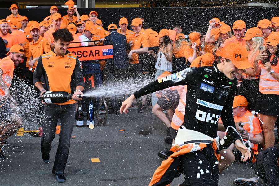 Oscar Piastri celebrates with the McLaren team after winning the Azerbaijan Grand Prix