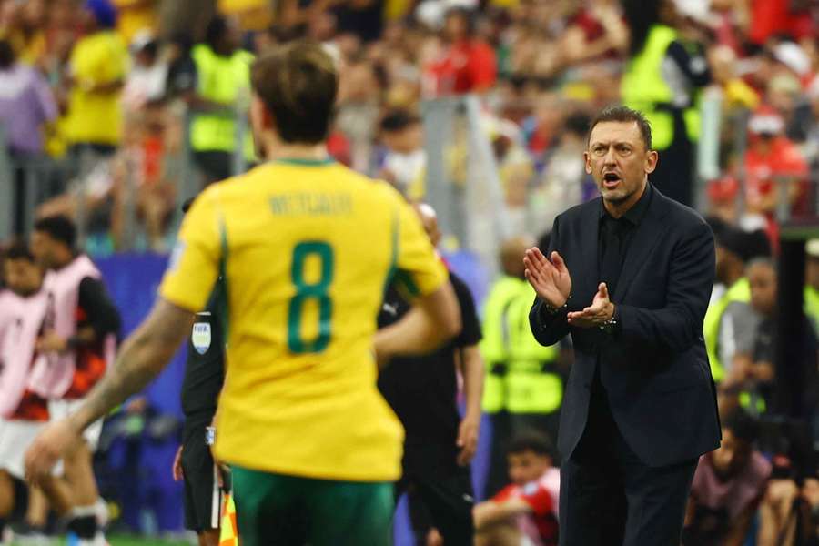 Tony Popovic applauding his players during the recent FIFA World Cup. 