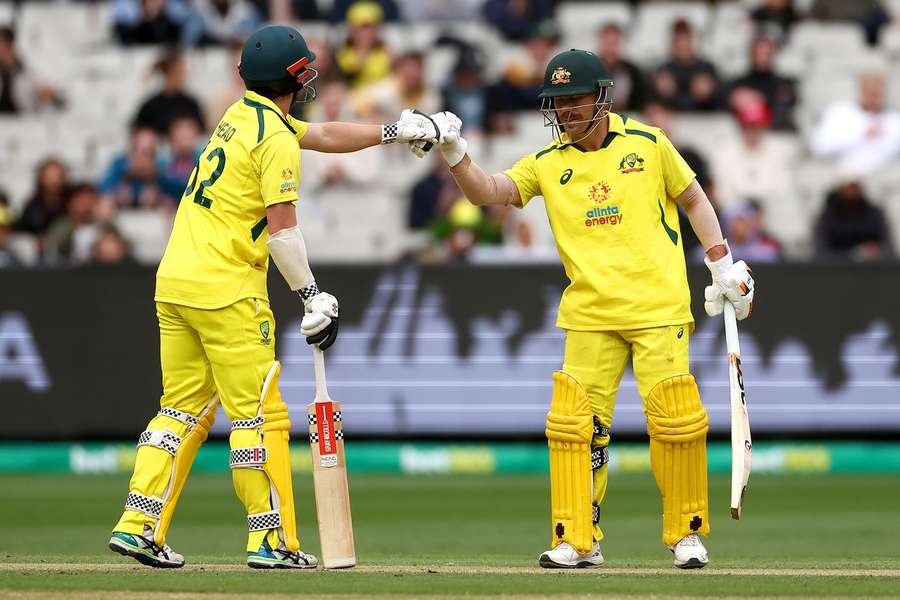 Travis Head, left, and David Warner put on 269 for the first wicket at the MCG