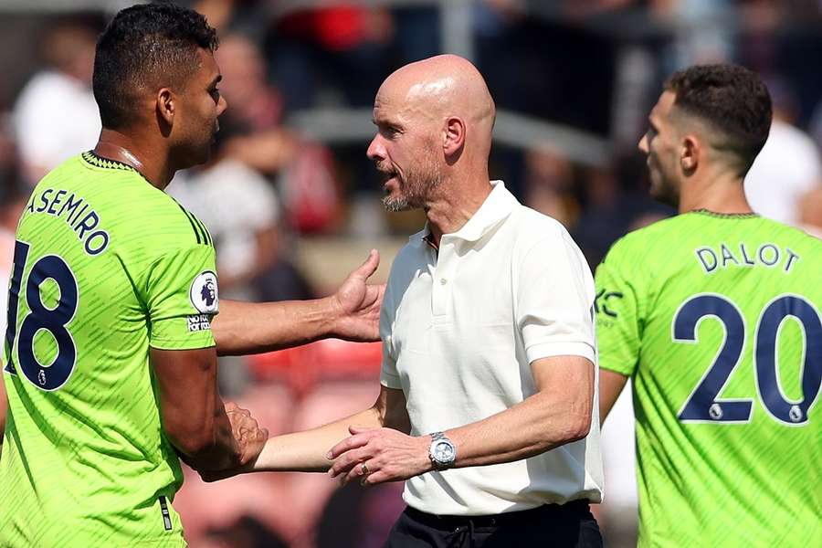 Casemiro (left) has been impressed by Manchester United manager Erik ten Hag (right) 