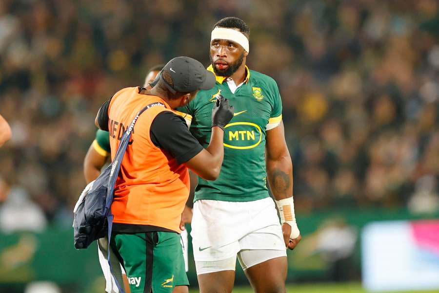 Siya Kolisi gets medical attention during the Rugby Championship match between South Africa and New Zealand 