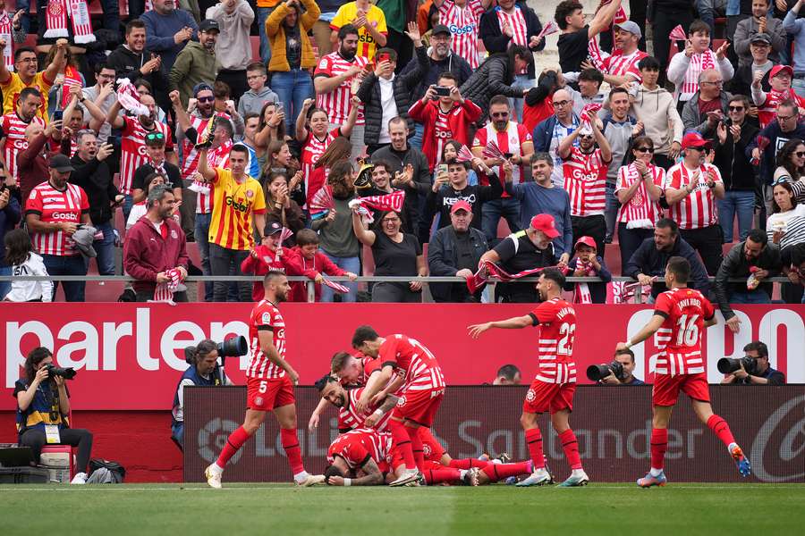 Girona celebrating their first goal