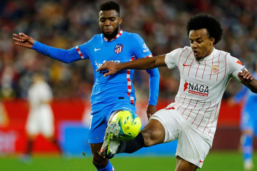 Jules Kounde, right, is the fifth summer signing for Barcelona