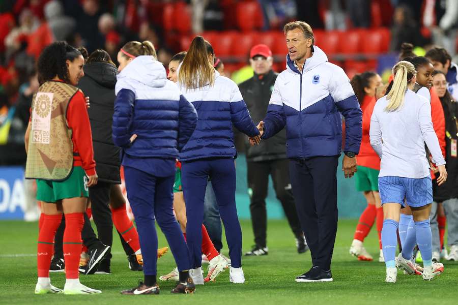 France coach Renard congratulates her team after their convincing 4-0 win against Morocco 