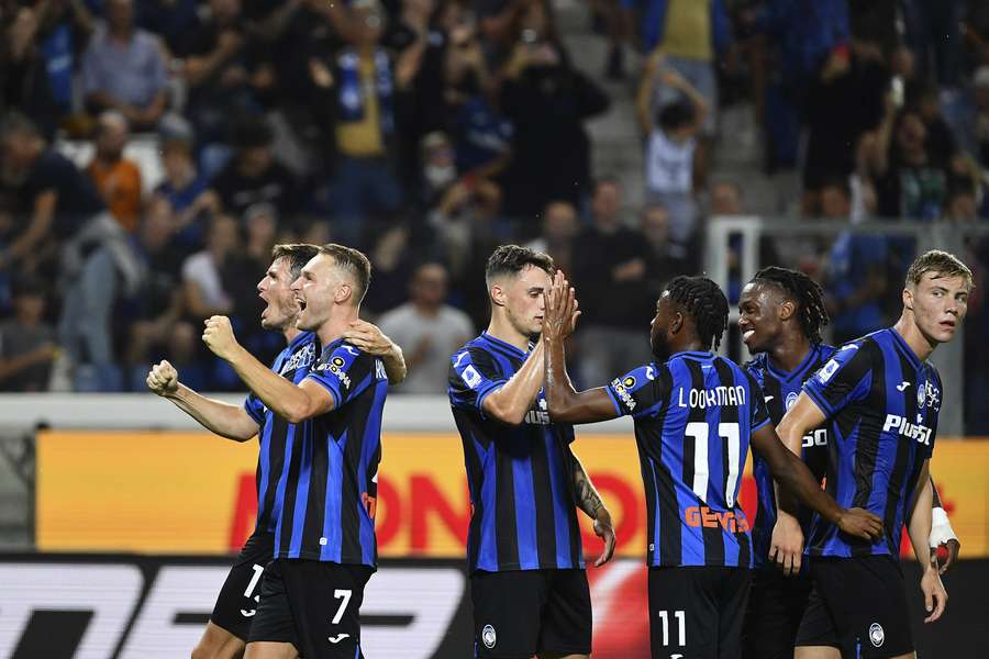Atalanta players celebrate scoring