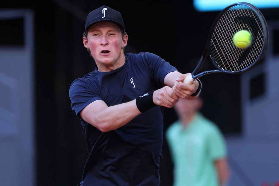 Denmark’s Elmer Moller returns the ball to Brazil’s Joao Fonseca during their 2025 ATP Tour Madrid Open