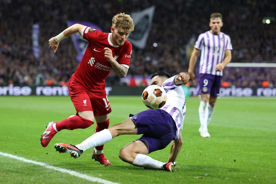 Liverpool's Harvey Elliott jumps over Toulouse's Gabriel Suazo