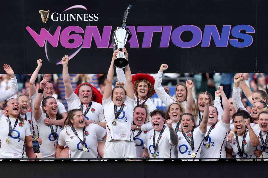 Zoe Aldcroft lifts the Women's Six Nations trophy after England beat France to secure a Grand Slam