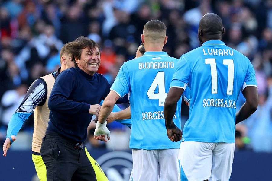 Conte celebrates during the match