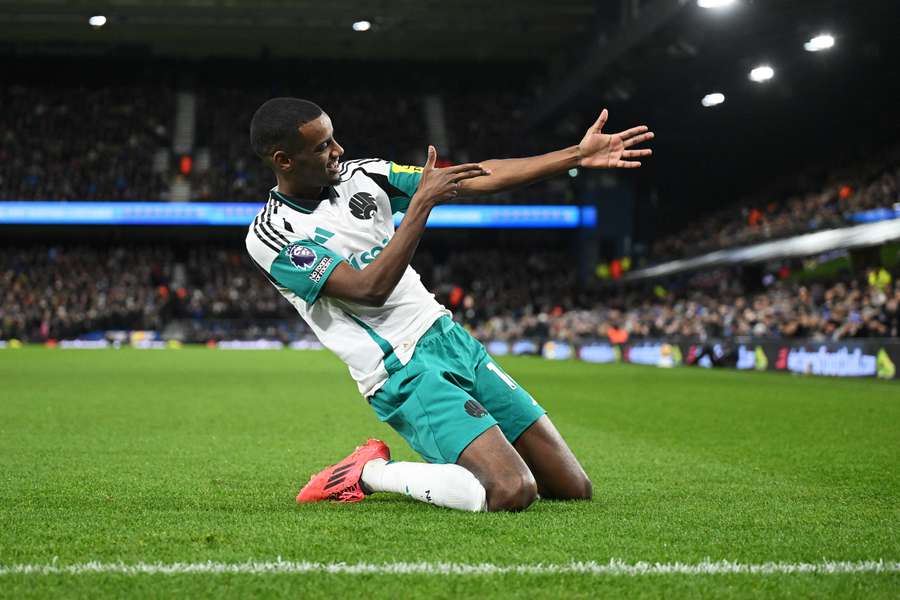 Alexander Isak celebrates scoring Newcastle's fourth goal to complete his hat-trick