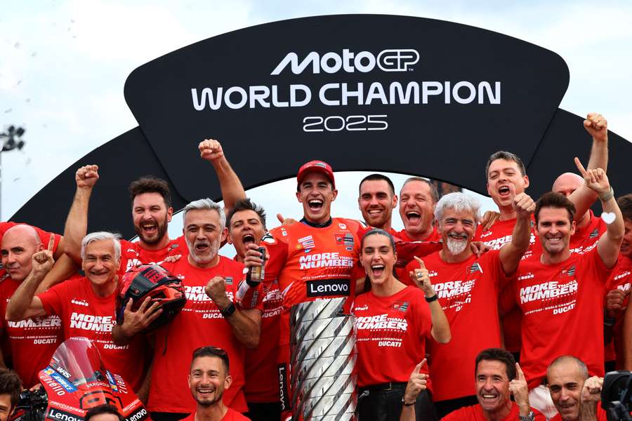 Marc Marquez celebrates his seventh world title