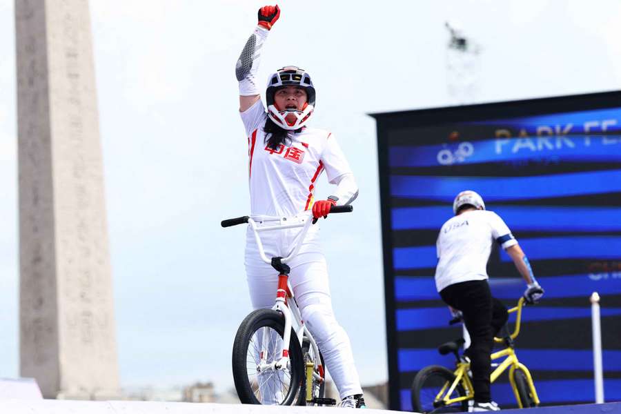 Yawen Deng of China reacts during run two